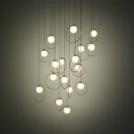 Lustra LED Portocolom 390346 de la Eglo este prezentată în ambient cu lumina aprinsă.