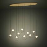 Lustra LED Portocolom 390347 de la Eglo este prezentată în ambient cu lumina aprinsă și montată pe tavan.