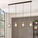 Lustra vintage Chisle Eglo 43528 este montată într-un interior modern, iar abajururile tip cușcă creează un joc decorativ de lumină caldă și umbre.