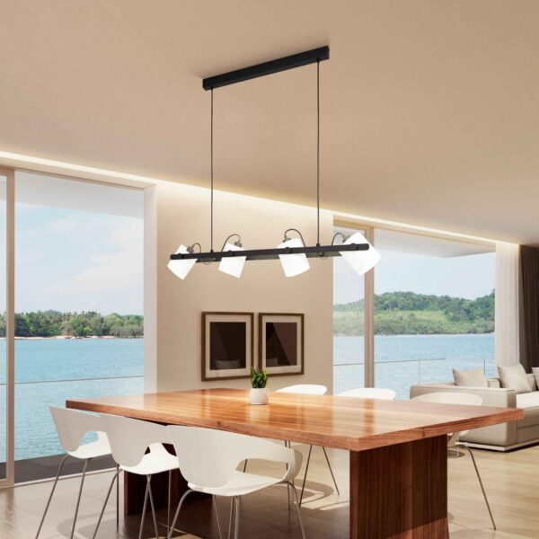 Lustra vintage Hornwood 1 Eglo 43425 într-un living modern, deasupra unei mese cu lumina aprinsă.