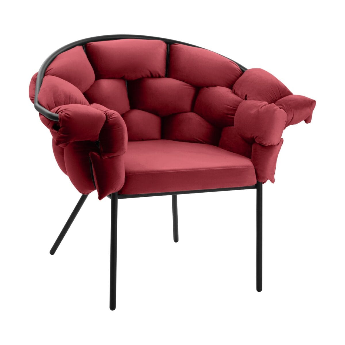 Red velvet armchair with black metal legs against a white background, shown from the side.
